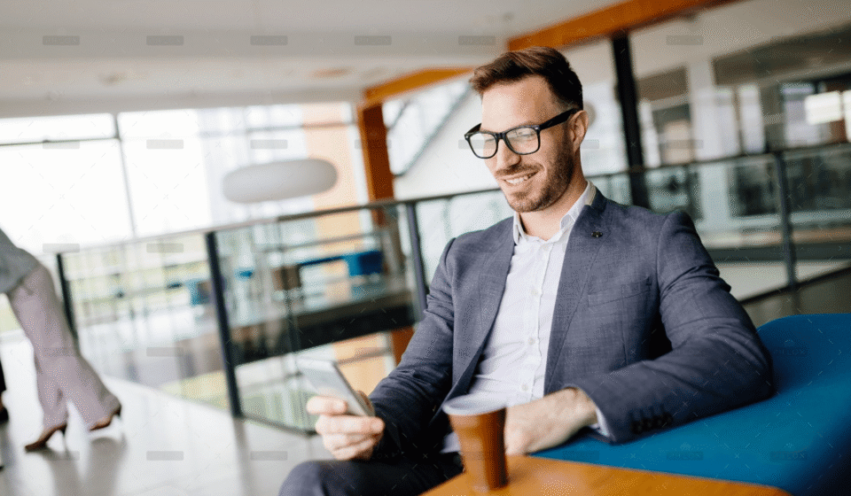 demo-attachment-713-businessman-taking-a-break-with-a-cup-of-coffee-JW4B3DH